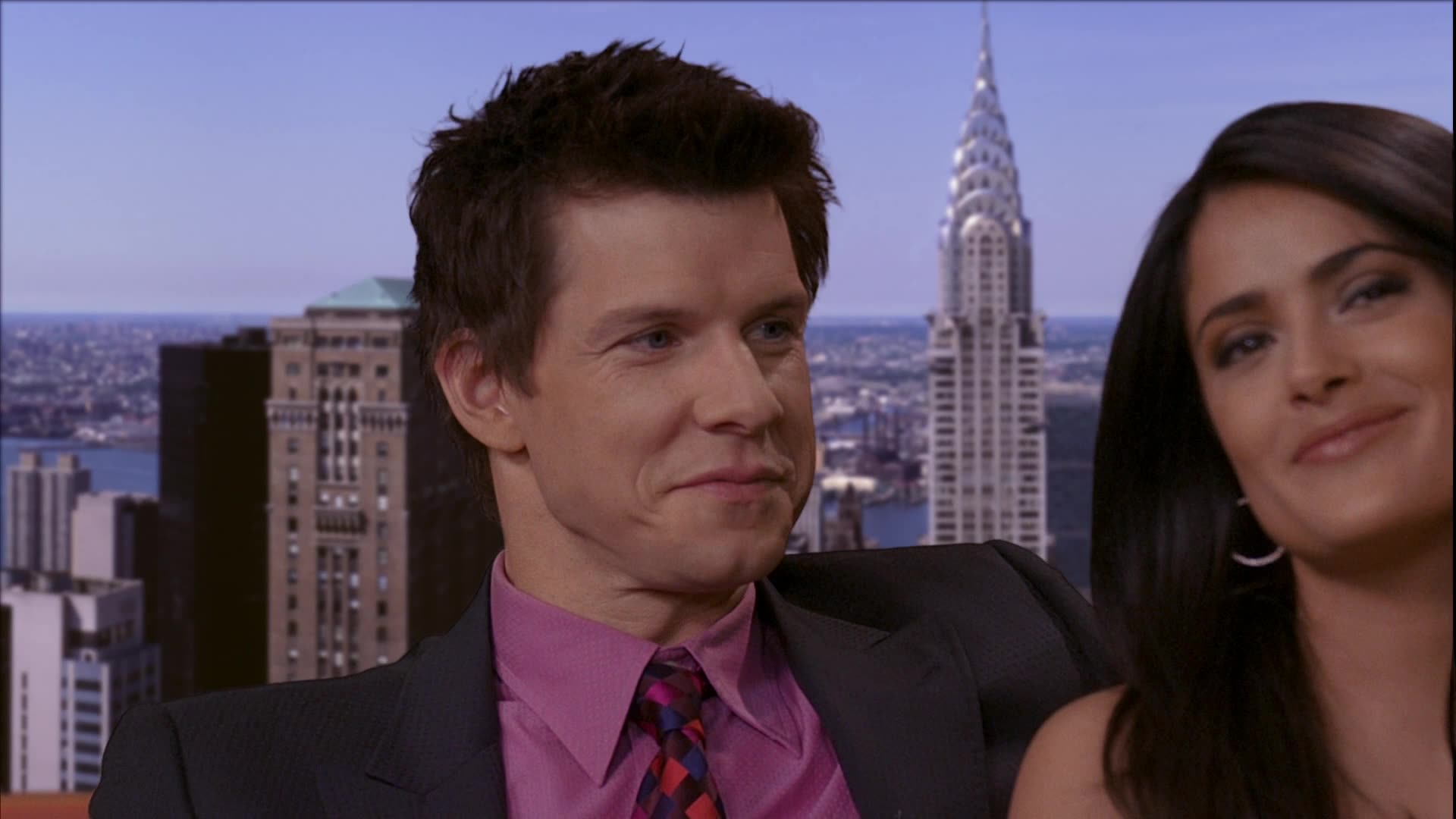 Salma Hayek sexy cleavage in blue dress being interviewed with Eric Mabius -- Ugly Betty