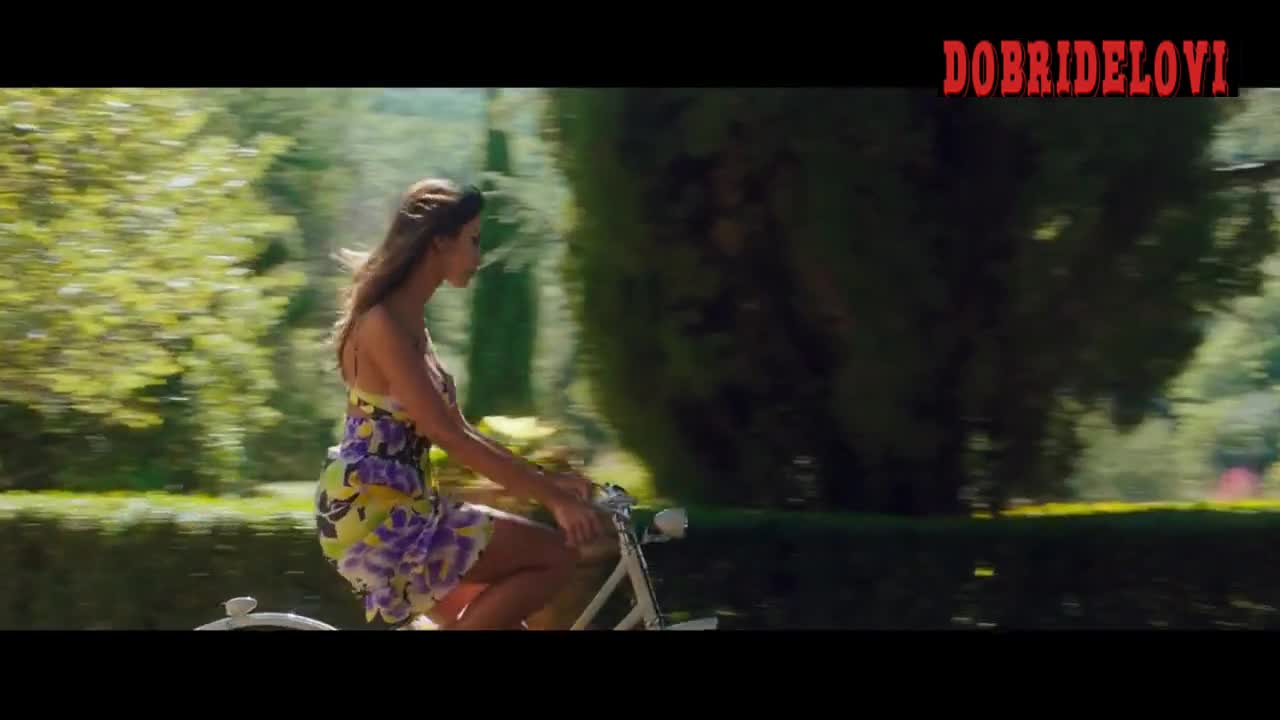 Madalina Diana Ghenea sexy riding bicycle scene from Dom Hemingway