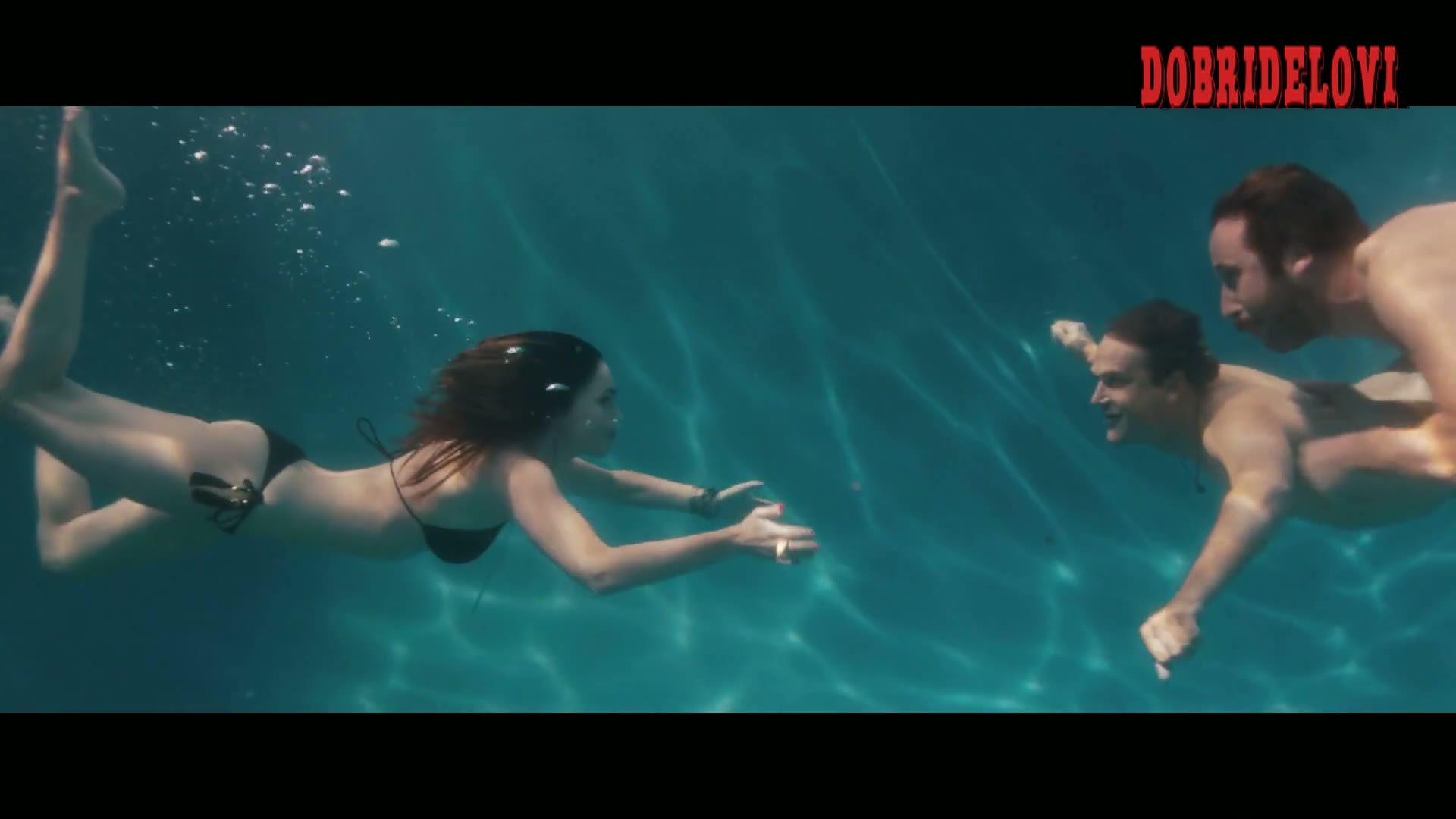 Megan Fox swimming in black bikini -- This is 40