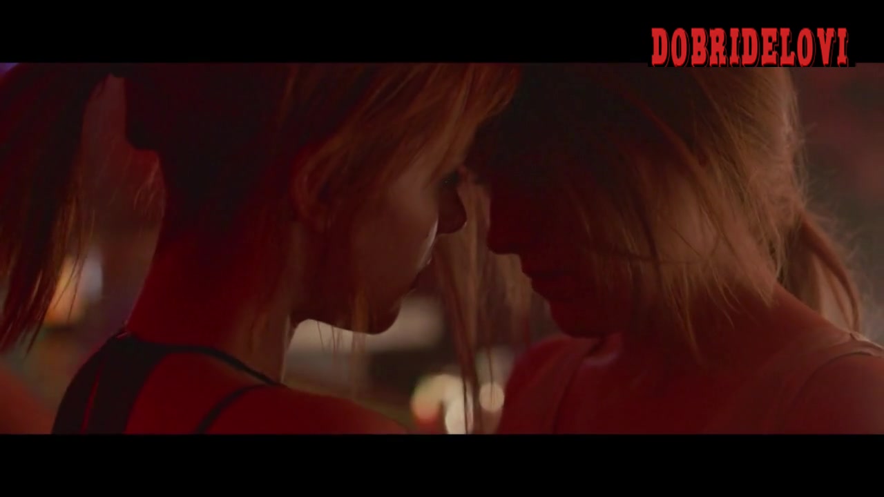 Riley Keough, Jena Malone red lighting scene from Lovesong
