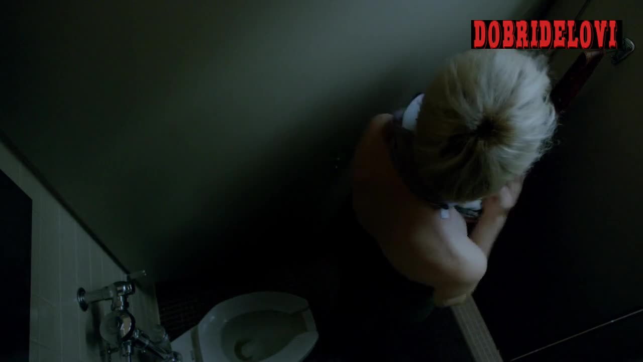 Mackenzie Davis changing clothes in public bathroom scene from Halt and Catch Fire