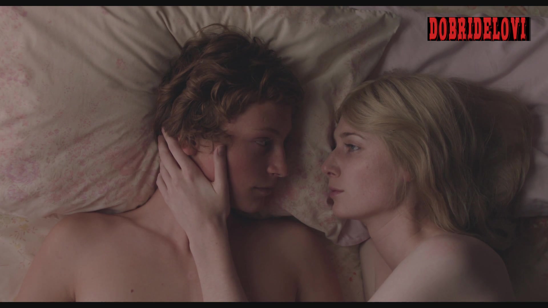 Elizabeth Debicki aying in bed with younger man scene from Breath