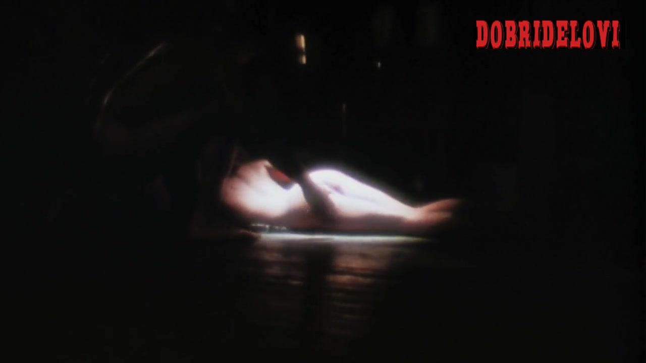 Deborah Kara Unger nude on floor scene from Whispers in the Dark