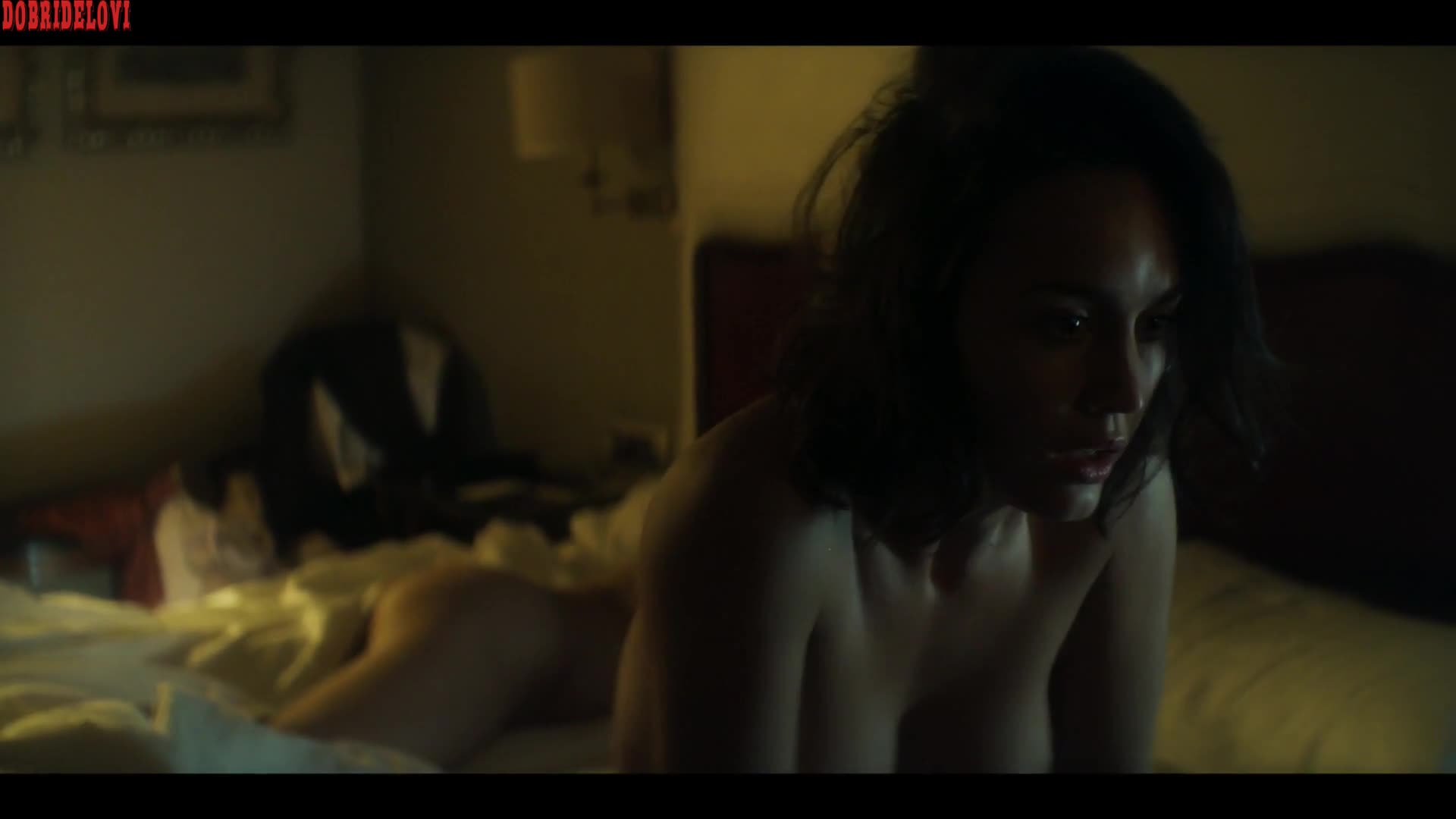 Megan Montaner wakes up naked in bed scene from 30 Coins